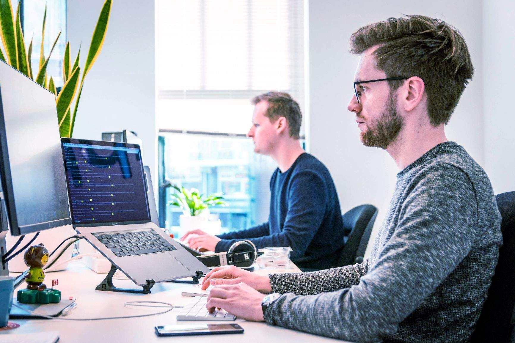 Workers in an office on their computers